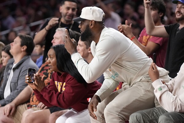 LeBron James talks Bronny s debut for Southern Cal AP News